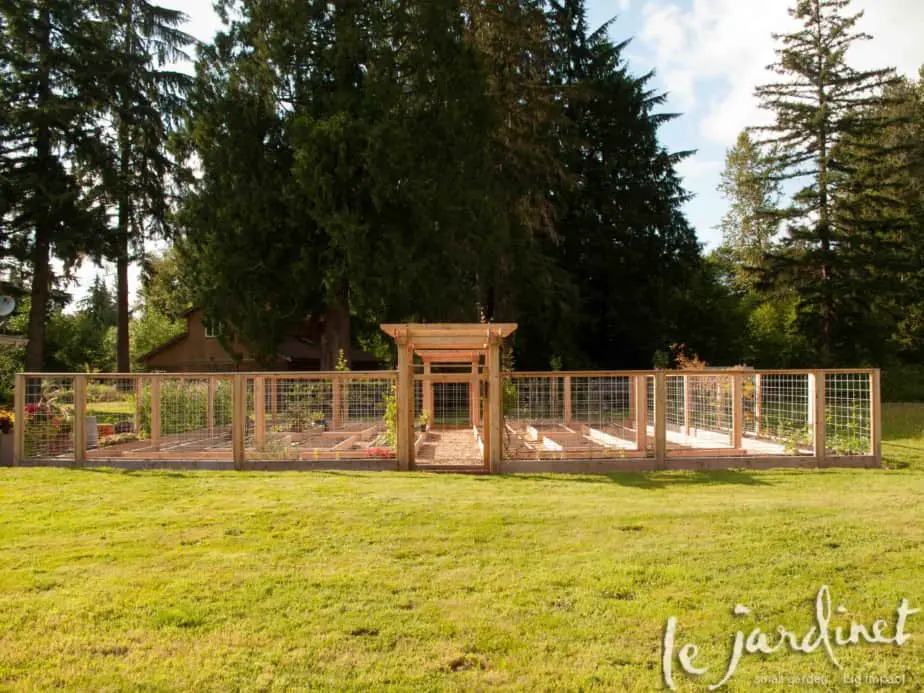 garden with tall fence to keep rabbits out